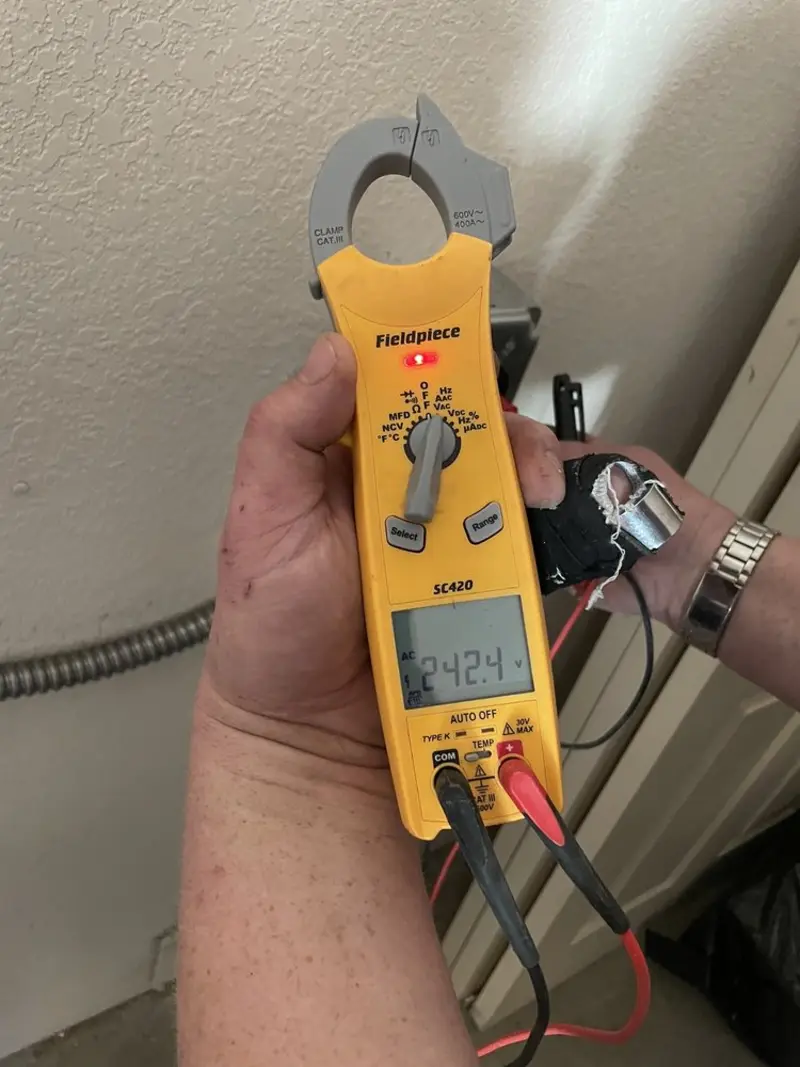 Voltage testing with clamp meter during Ceiling Fan Installation in California City